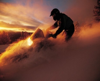  Snowmobiling at sunset 